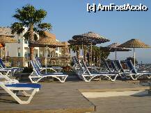 [P06] Poza de langa piscina, iar in plan departat, unul din corpurile secundare ale hotelului » foto by alinviola
 - 
<span class="allrVoted glyphicon glyphicon-heart hidden" id="av2810"></span>
<a class="m-l-10 hidden" id="sv2810" onclick="voting_Foto_DelVot(,2810,258)" role="button">șterge vot <span class="glyphicon glyphicon-remove"></span></a>
<a id="v92810" class=" c-red"  onclick="voting_Foto_SetVot(2810)" role="button"><span class="glyphicon glyphicon-heart-empty"></span> <b>LIKE</b> = Votează poza</a> <img class="hidden"  id="f2810W9" src="/imagini/loader.gif" border="0" /><span class="AjErrMes hidden" id="e2810ErM"></span>