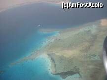 [P29] Coralii şi ţărmul mării din avion. Poza e puţin neclară datorită furtunii de nisip prin care am trecut » foto by Maditu16
 - 
<span class="allrVoted glyphicon glyphicon-heart hidden" id="av212520"></span>
<a class="m-l-10 hidden" id="sv212520" onclick="voting_Foto_DelVot(,212520,36)" role="button">șterge vot <span class="glyphicon glyphicon-remove"></span></a>
<a id="v9212520" class=" c-red"  onclick="voting_Foto_SetVot(212520)" role="button"><span class="glyphicon glyphicon-heart-empty"></span> <b>LIKE</b> = Votează poza</a> <img class="hidden"  id="f212520W9" src="/imagini/loader.gif" border="0" /><span class="AjErrMes hidden" id="e212520ErM"></span>