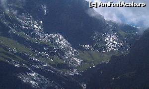 [P11] O parte din ghețarii muntelui Wettehorn văzuți din partea vestică a satului Grindelwald din Alpii Bernezi, Elveția.  » foto by traian.leuca †
 - 
<span class="allrVoted glyphicon glyphicon-heart hidden" id="av594829"></span>
<a class="m-l-10 hidden" id="sv594829" onclick="voting_Foto_DelVot(,594829,2252)" role="button">șterge vot <span class="glyphicon glyphicon-remove"></span></a>
<a id="v9594829" class=" c-red"  onclick="voting_Foto_SetVot(594829)" role="button"><span class="glyphicon glyphicon-heart-empty"></span> <b>LIKE</b> = Votează poza</a> <img class="hidden"  id="f594829W9" src="/imagini/loader.gif" border="0" /><span class="AjErrMes hidden" id="e594829ErM"></span>