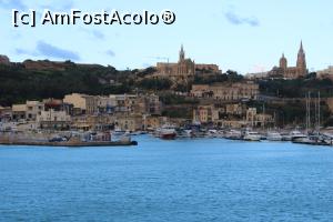 [P01] Malta, Insula Gozo, Mgarr văzut de pe ferry, se văd cele două biserici pe care le-am vizitat, stânga Biserica Madonei din Lourdes și dreapta Biserica parohială » foto by mprofeanu
 - 
<span class="allrVoted glyphicon glyphicon-heart hidden" id="av1275900"></span>
<a class="m-l-10 hidden" id="sv1275900" onclick="voting_Foto_DelVot(,1275900,3422)" role="button">șterge vot <span class="glyphicon glyphicon-remove"></span></a>
<a id="v91275900" class=" c-red"  onclick="voting_Foto_SetVot(1275900)" role="button"><span class="glyphicon glyphicon-heart-empty"></span> <b>LIKE</b> = Votează poza</a> <img class="hidden"  id="f1275900W9" src="/imagini/loader.gif" border="0" /><span class="AjErrMes hidden" id="e1275900ErM"></span>