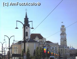 [P26] Biserica Sf Ladislau și în fundal primăria și turnul său.  » foto by Carmen Ion
 - 
<span class="allrVoted glyphicon glyphicon-heart hidden" id="av1118542"></span>
<a class="m-l-10 hidden" id="sv1118542" onclick="voting_Foto_DelVot(,1118542,3848)" role="button">șterge vot <span class="glyphicon glyphicon-remove"></span></a>
<a id="v91118542" class=" c-red"  onclick="voting_Foto_SetVot(1118542)" role="button"><span class="glyphicon glyphicon-heart-empty"></span> <b>LIKE</b> = Votează poza</a> <img class="hidden"  id="f1118542W9" src="/imagini/loader.gif" border="0" /><span class="AjErrMes hidden" id="e1118542ErM"></span>