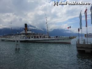 [P18] Montreux - 'La Suisse' construit in 1910, se apropie de debarcader.  » foto by iulianic
 - 
<span class="allrVoted glyphicon glyphicon-heart hidden" id="av368105"></span>
<a class="m-l-10 hidden" id="sv368105" onclick="voting_Foto_DelVot(,368105,7614)" role="button">șterge vot <span class="glyphicon glyphicon-remove"></span></a>
<a id="v9368105" class=" c-red"  onclick="voting_Foto_SetVot(368105)" role="button"><span class="glyphicon glyphicon-heart-empty"></span> <b>LIKE</b> = Votează poza</a> <img class="hidden"  id="f368105W9" src="/imagini/loader.gif" border="0" /><span class="AjErrMes hidden" id="e368105ErM"></span>