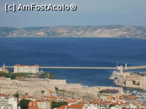 [P45] De la Notre Dame de la Garde, un zoom pe intrarea în Vieux Port, Palatul Pharo şi ambele forturi ce-l încadrează » foto by irinad
 - 
<span class="allrVoted glyphicon glyphicon-heart hidden" id="av1131829"></span>
<a class="m-l-10 hidden" id="sv1131829" onclick="voting_Foto_DelVot(,1131829,7772)" role="button">șterge vot <span class="glyphicon glyphicon-remove"></span></a>
<a id="v91131829" class=" c-red"  onclick="voting_Foto_SetVot(1131829)" role="button"><span class="glyphicon glyphicon-heart-empty"></span> <b>LIKE</b> = Votează poza</a> <img class="hidden"  id="f1131829W9" src="/imagini/loader.gif" border="0" /><span class="AjErrMes hidden" id="e1131829ErM"></span>