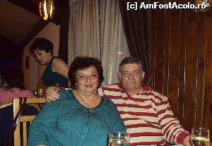 [P05] La masa festivă, alături de stăpânul inimii mele Adrian (nume de cod Antheus), cu inconfundabila lui mustaţa stufoasă - deşi cam albită de vreme » foto by Carmen Ion
 - 
<span class="allrVoted glyphicon glyphicon-heart hidden" id="av605824"></span>
<a class="m-l-10 hidden" id="sv605824" onclick="voting_Foto_DelVot(,605824,17815)" role="button">șterge vot <span class="glyphicon glyphicon-remove"></span></a>
<a id="v9605824" class=" c-red"  onclick="voting_Foto_SetVot(605824)" role="button"><span class="glyphicon glyphicon-heart-empty"></span> <b>LIKE</b> = Votează poza</a> <img class="hidden"  id="f605824W9" src="/imagini/loader.gif" border="0" /><span class="AjErrMes hidden" id="e605824ErM"></span>