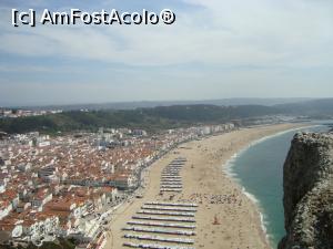 [P02] Praia de Nazare, vedere de ansamblu din oraselul de sus si plaja lunga ca o soparla, invadata de corturile ,,maure ''.  » foto by mireille
 - 
<span class="allrVoted glyphicon glyphicon-heart hidden" id="av817126"></span>
<a class="m-l-10 hidden" id="sv817126" onclick="voting_Foto_DelVot(,817126,21318)" role="button">șterge vot <span class="glyphicon glyphicon-remove"></span></a>
<a id="v9817126" class=" c-red"  onclick="voting_Foto_SetVot(817126)" role="button"><span class="glyphicon glyphicon-heart-empty"></span> <b>LIKE</b> = Votează poza</a> <img class="hidden"  id="f817126W9" src="/imagini/loader.gif" border="0" /><span class="AjErrMes hidden" id="e817126ErM"></span>